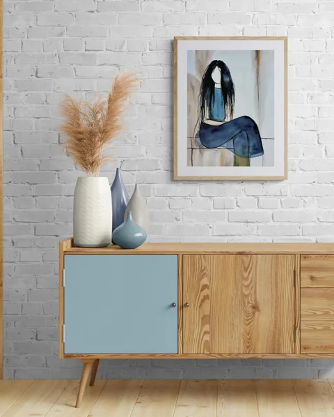 Faceless Woman with Long Dark Hair in Blue