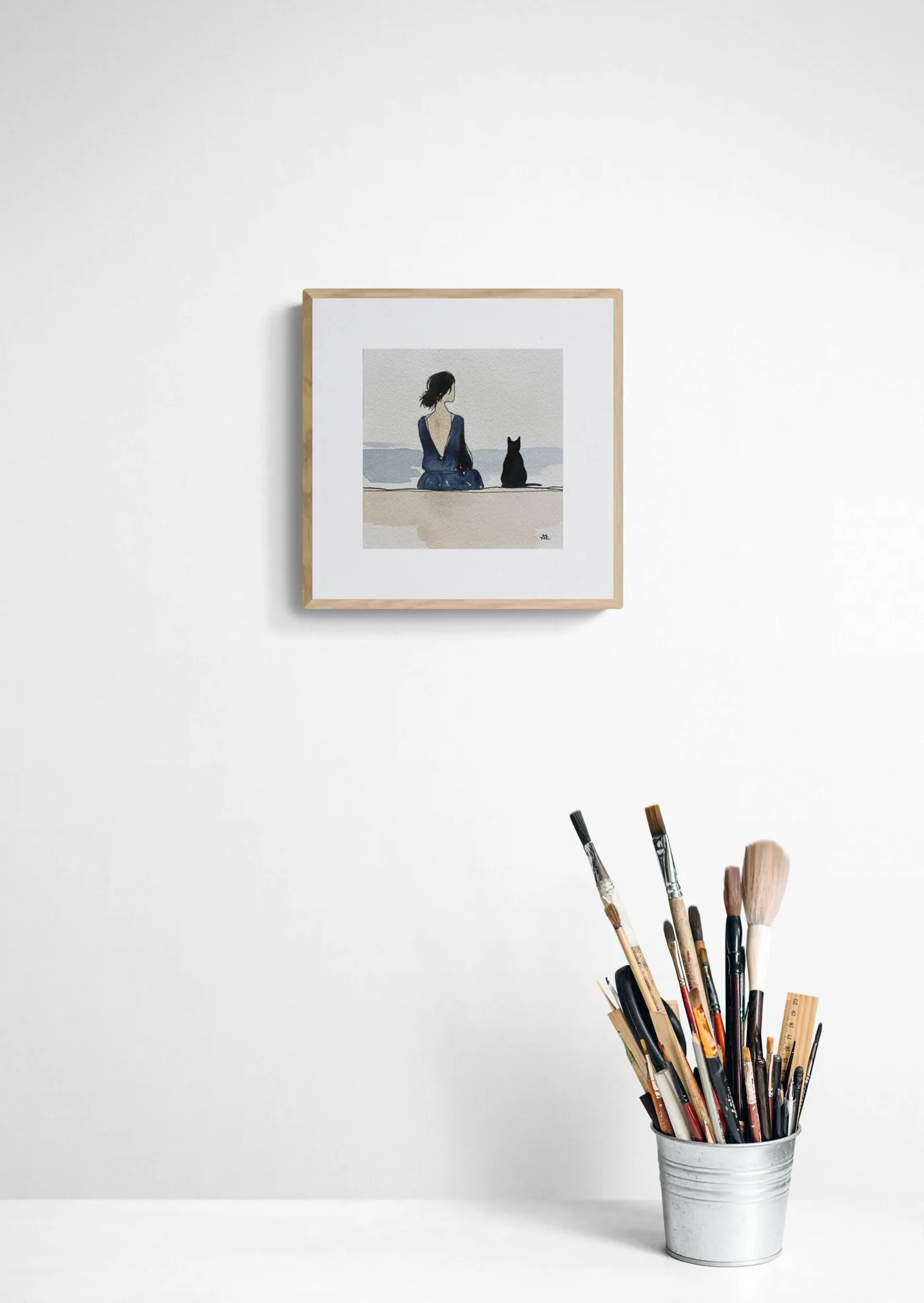 Woman and Black Cat by the Sea